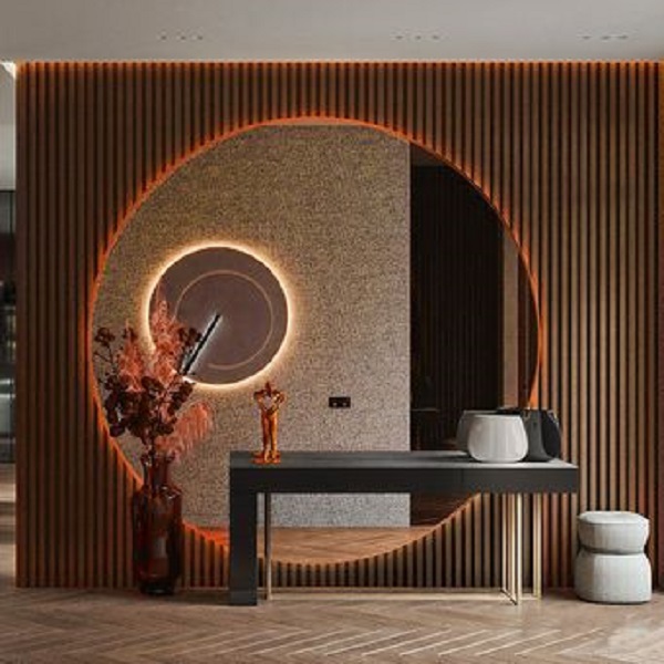 wpc fluted wall panel behind a round mirror with light effects.